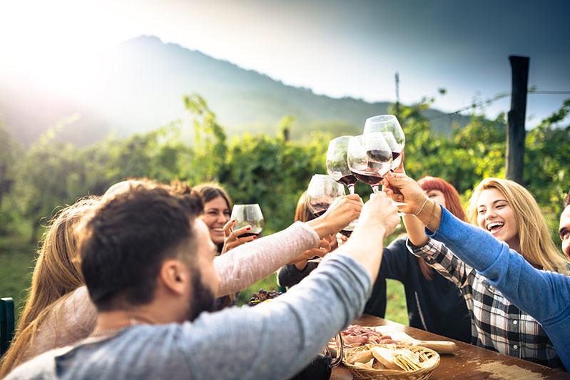 People enjoying wine together